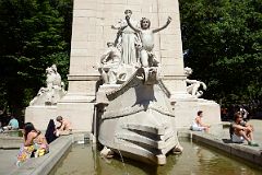 20 Maine Monument Young Boy Holds Up His Arms As Ship Prow Protrudes From The Pylon In New York Columbus Circle.jpg